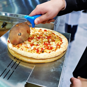 cutting a pizza cutting a pizza
